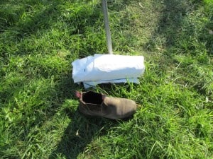 Rolls up a little bigger than my boot, weighs < 600 grams. Costs approx $20